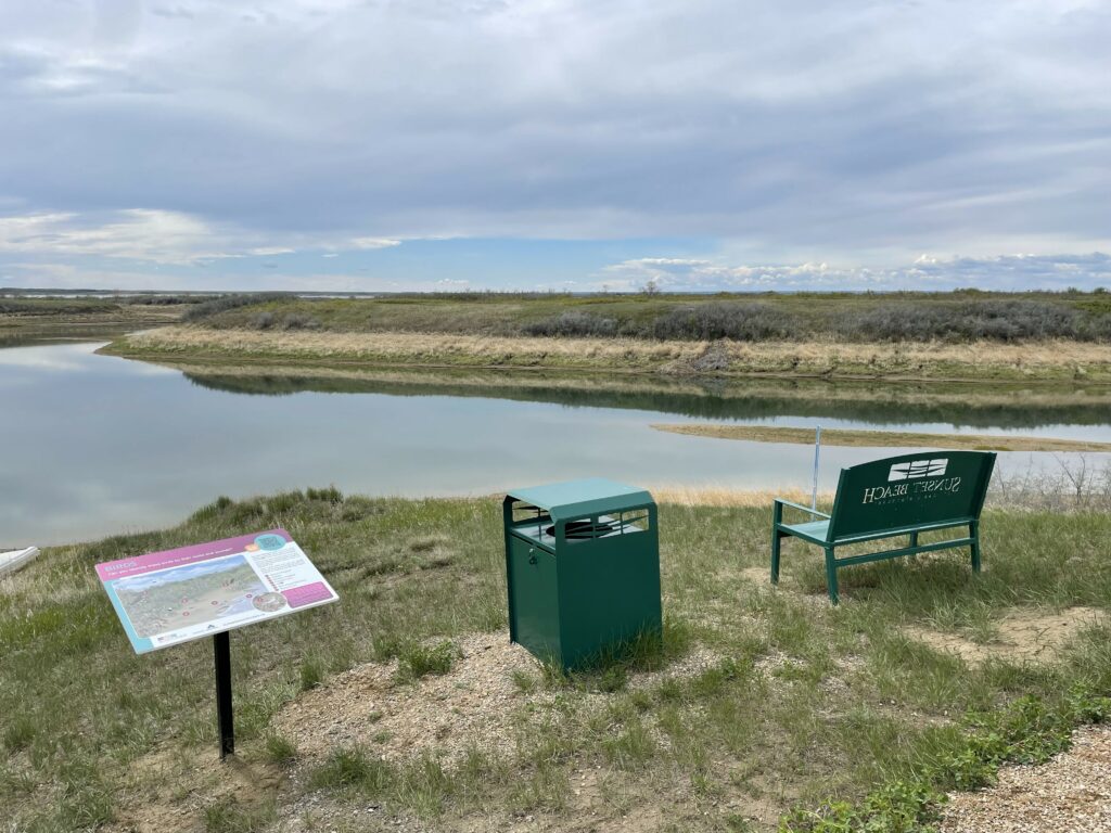 Sunset Beach Recreational Trails with bench and interpretive signs